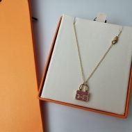 Hermes Constance Amulette Pendant Necklace In Pink